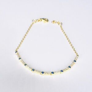 Elegant 18K Gold & Sterling Silver Bracelet with Blue Sapphire sStones
